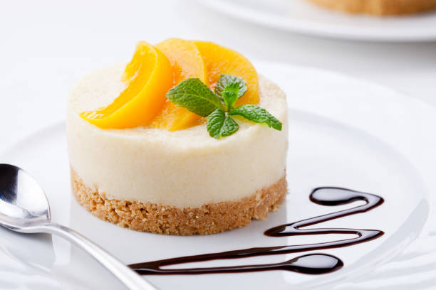 istock Homemade Cheesecake With Poached Peaches 881550436