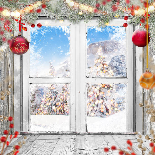 istock Christmas old white window with decorations 881554752