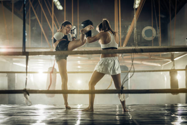 istock Leg kick on a kickboxing match! 881555338