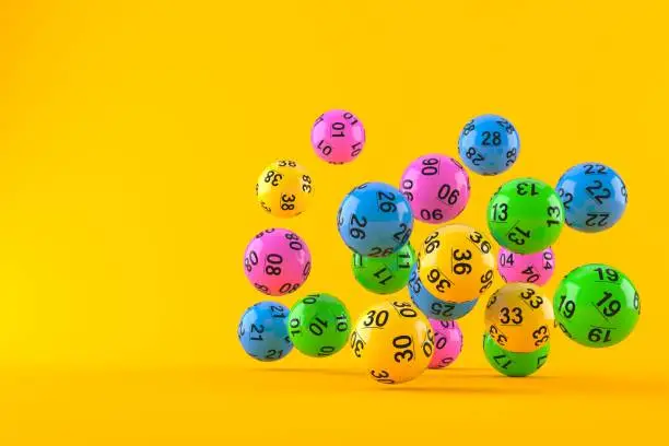 Lottery balls isolated on orange background