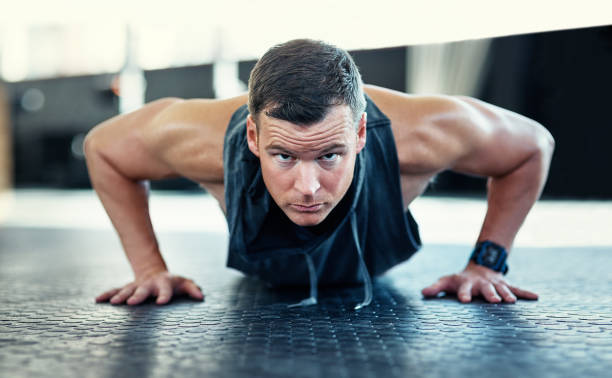 istock Do your push ups and don't give up 881567060