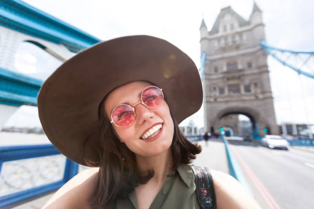 istock Cheerful woman having fun and looking at camera 881574980