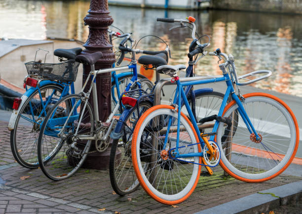 istock Bicycles parking in Amsterdam city, The Netherlands 881575574