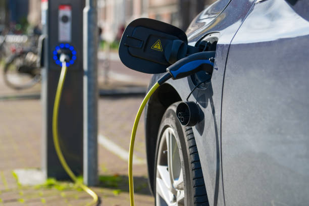 istock Electric car loading at power station in Amsterdam, The Netherlands 881575670