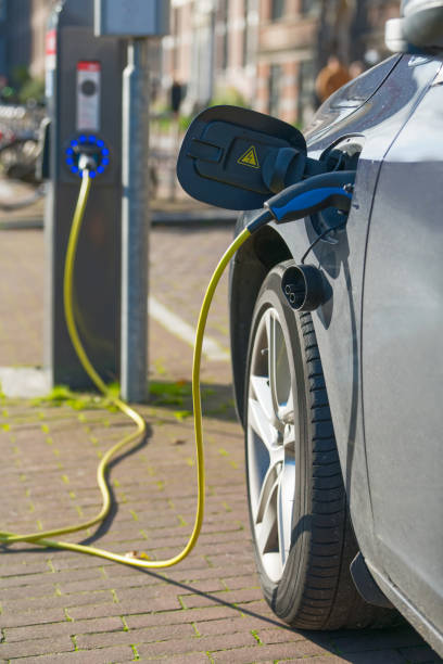 istock Electric car loading at power station in Amsterdam, The Netherlands 881575694