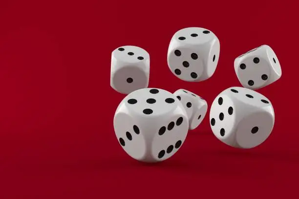 Dice isolated on red background