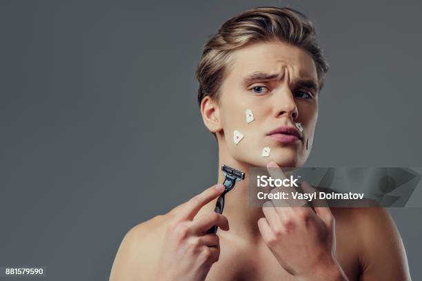 Handsome Man On Grey Background Stock Photo - Download Image Now - Shaving, Men, Beard