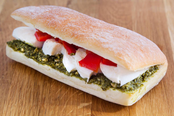 istock very delicious mozzarella pesto and tomato sandwich 881579778