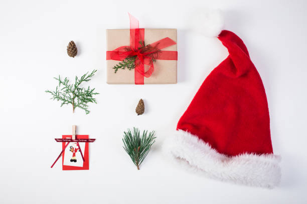 istock Christmas composition. Gift, christmas decoration, cypress branches, pine cones on white background 881584872