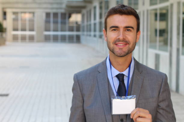 istock Businessman showing his credentials with copy space 881591308