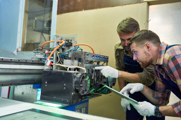 istock Mechanics Fixing Machine at Factory 881591830