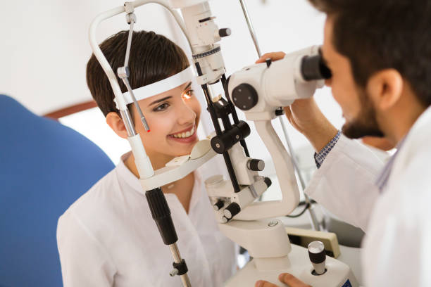 istock Optometrist examining patient in modern ophthalmology clinic 881592464
