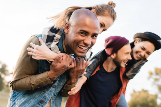 istock happy couples piggybacking together 881603660