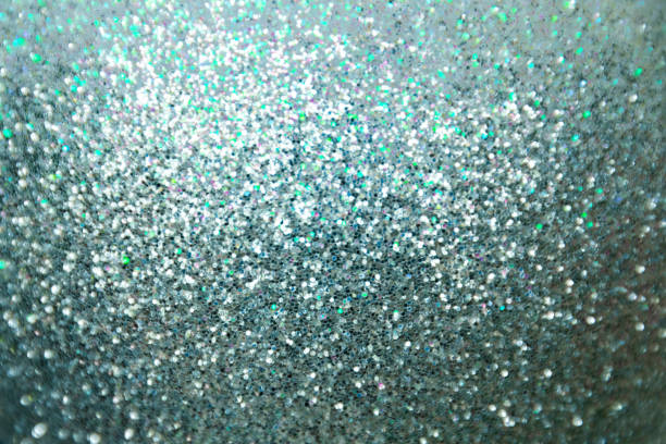 istock Abstract blurred bokeh of blue twinkled glitter use for christmas background. 881609784