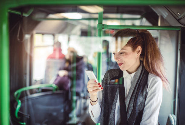 istock Businesswoman Taking Public Transportation 881610186