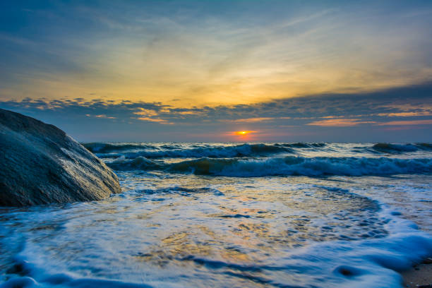 istock Beautiful sunrise over the sea 881634866