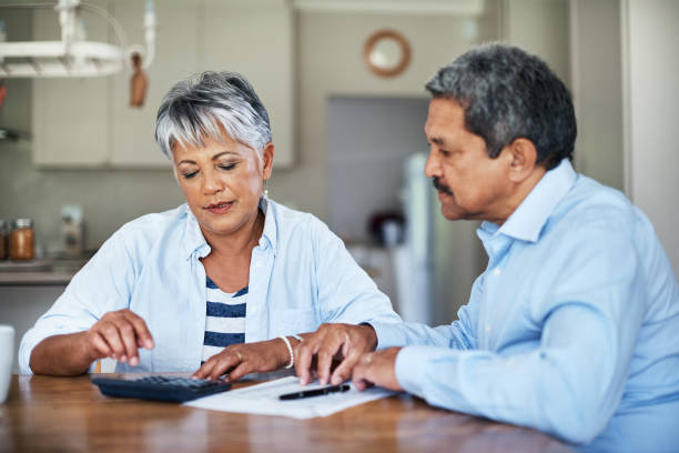 istock Looking at their investments 881635074