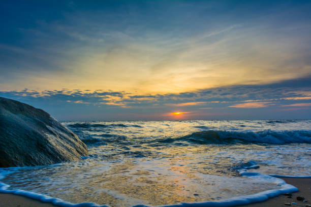 istock Beautiful sunrise over the sea 881635460