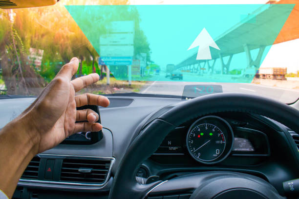 istock Car dashboard with steering wheel on blurry street background. Using wallpaper or background for transport and drive image. 881638552
