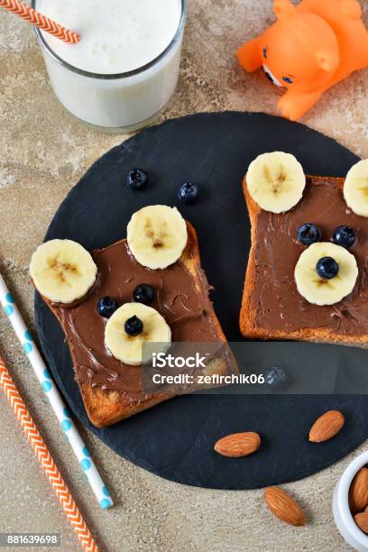 Breakfast For Children Toast With Chocolate Paste Banana And Berries Good  Morning Stock Photo - Download Image Now - iStock