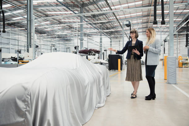 istock Female Car Salesperson 881645366