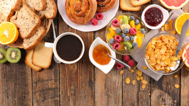 istock breakfast with coffee,croissant and fruit 881653854