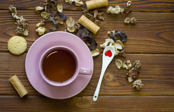 istock Still life with a tea cup, spoon and dry leaves 881655358