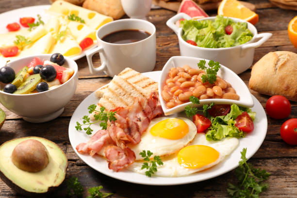istock breakfast with egg,bacon,toast,cheese and coffee 881657478