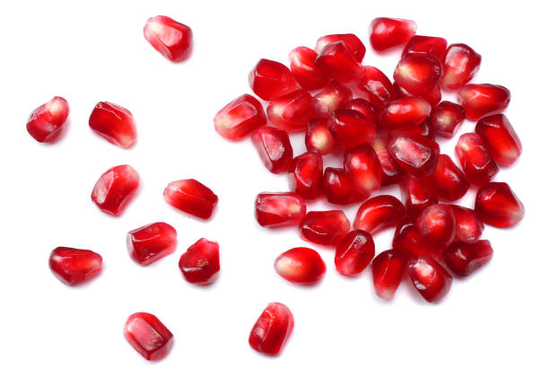 istock pomegranate seeds isolated on white background. top view. pomegranate berries. 881663988