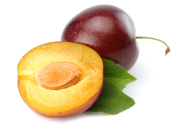 istock fresh plum fruit with cut plum slices isolated on white background 881664054