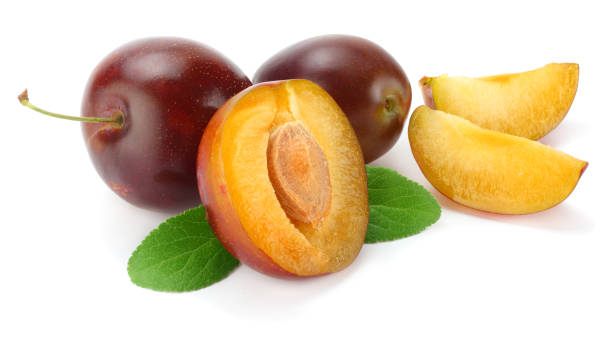istock fresh plum fruit with green leaf and cut plum slices isolated on white background 881664162
