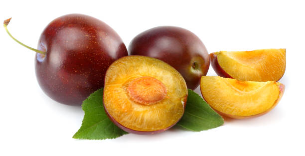 istock fresh plum fruit with cut plum slices isolated on white background 881664176