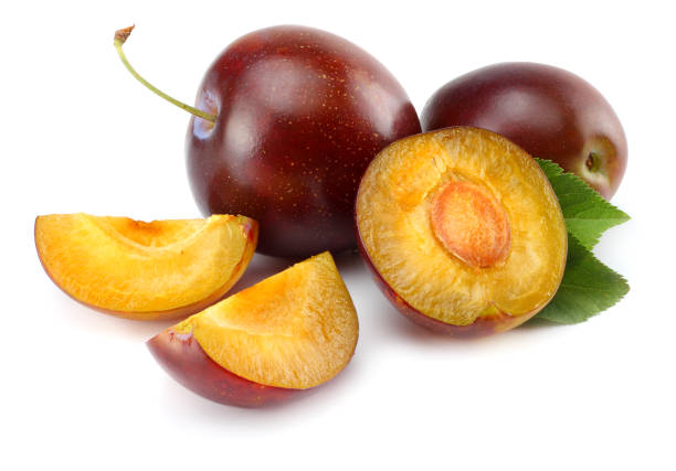 istock fresh plum fruit with cut plum slices isolated on white background 881664196