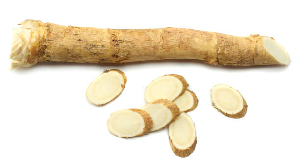 istock sliced horseradish root with parsley isolated on white background 881664238