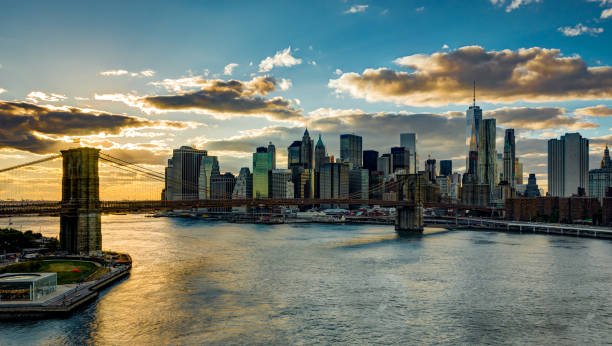 istock New York Skyline with Brooklyn Bridge Hudson River Manhatten dur 881671136
