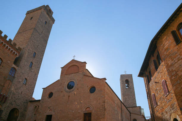 istock Tall tower above Palazzo del Popolo 881680408