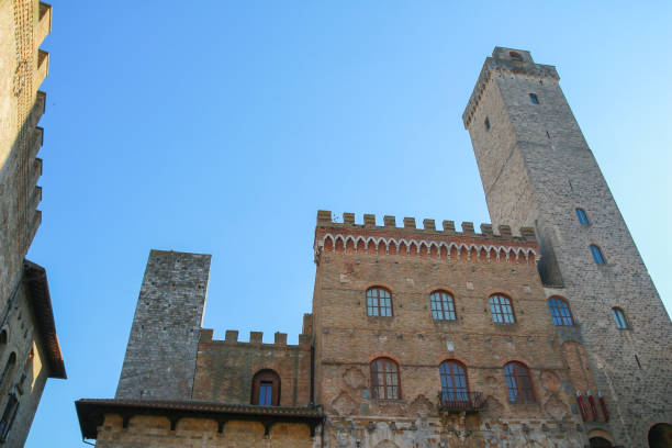 istock Tall tower above Palazzo del Popolo 881681324