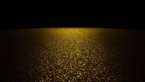 fundo de brilho - glitter dourado cintilante em um palco iluminado por uma luz brilhante na frente de um fundo preto - gold bright brightly lit light - fotografias e filmes do acervo