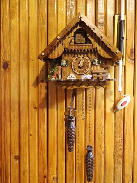 istock cuckoo clock on a wooden wall 881687626