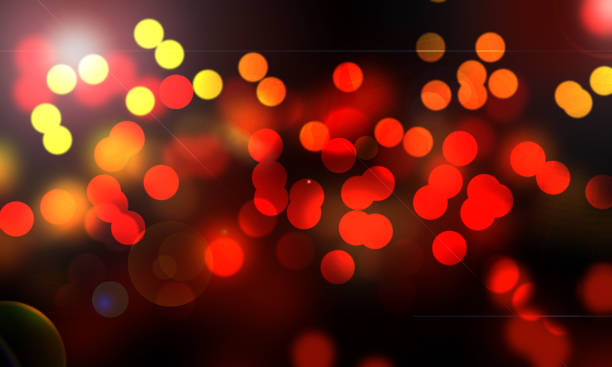 istock Christmas holiday festive glittering defocused red background with bokeh lights 881692826