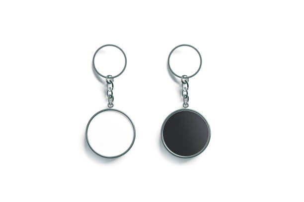 Blank metal round black and white key chain mock up Blank metal round black and white key chain mock up top view, 3d rendering. Clear silver circular keychain design mockup isolated. Empty plain keyring souvenir holder template. Steel trinket label pendant stock pictures, royalty-free photos & images