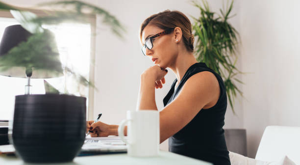 istock Woman at work in office 881707630