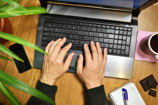 istock work at the Desk  for a laptop 881723520