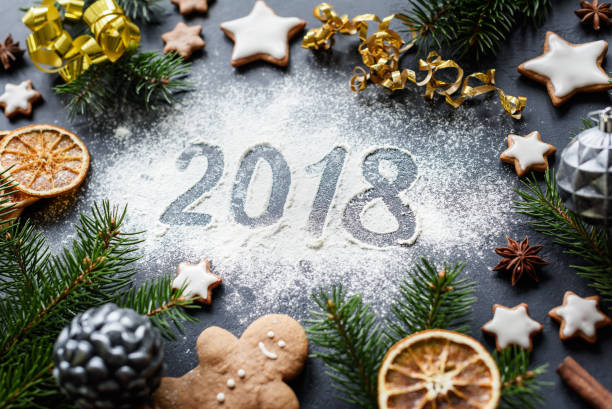 istock 2018 New Year greeting written on flour. Greeting card 881733282