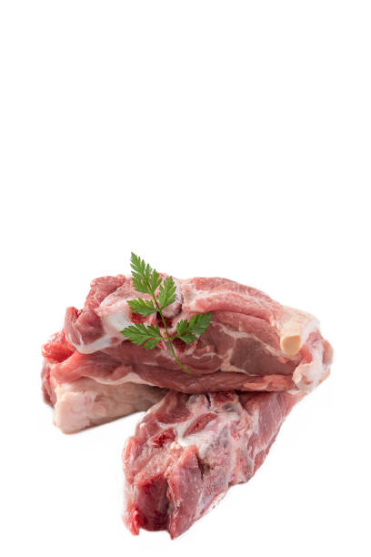 istock uncooked raw lamb ribs served on WHITE BACKGROUND HORIZPNTAL PICTURE 881740072