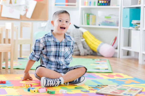 istock Adorable boy in day care 881751912
