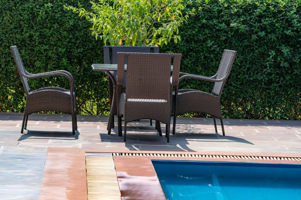 istock Deck chairs near the swimming pool 881752122