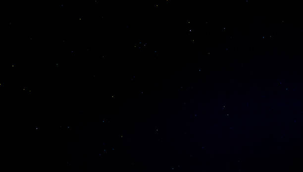 istock Many glowing colorful stars in the sky at night. 881753206