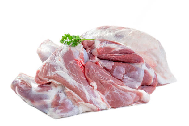 Fresh uncooked spring lamb shoulder joint isolated on a white background stock photo