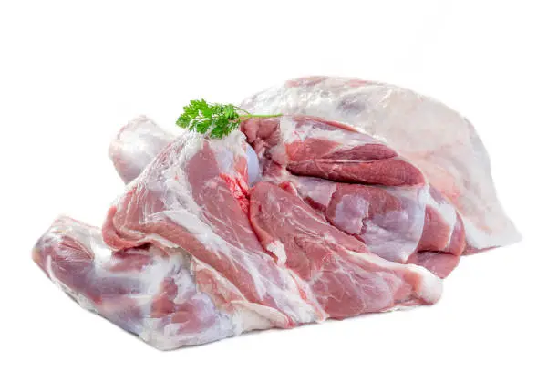 Fresh uncooked spring lamb shoulder joint isolated on white background